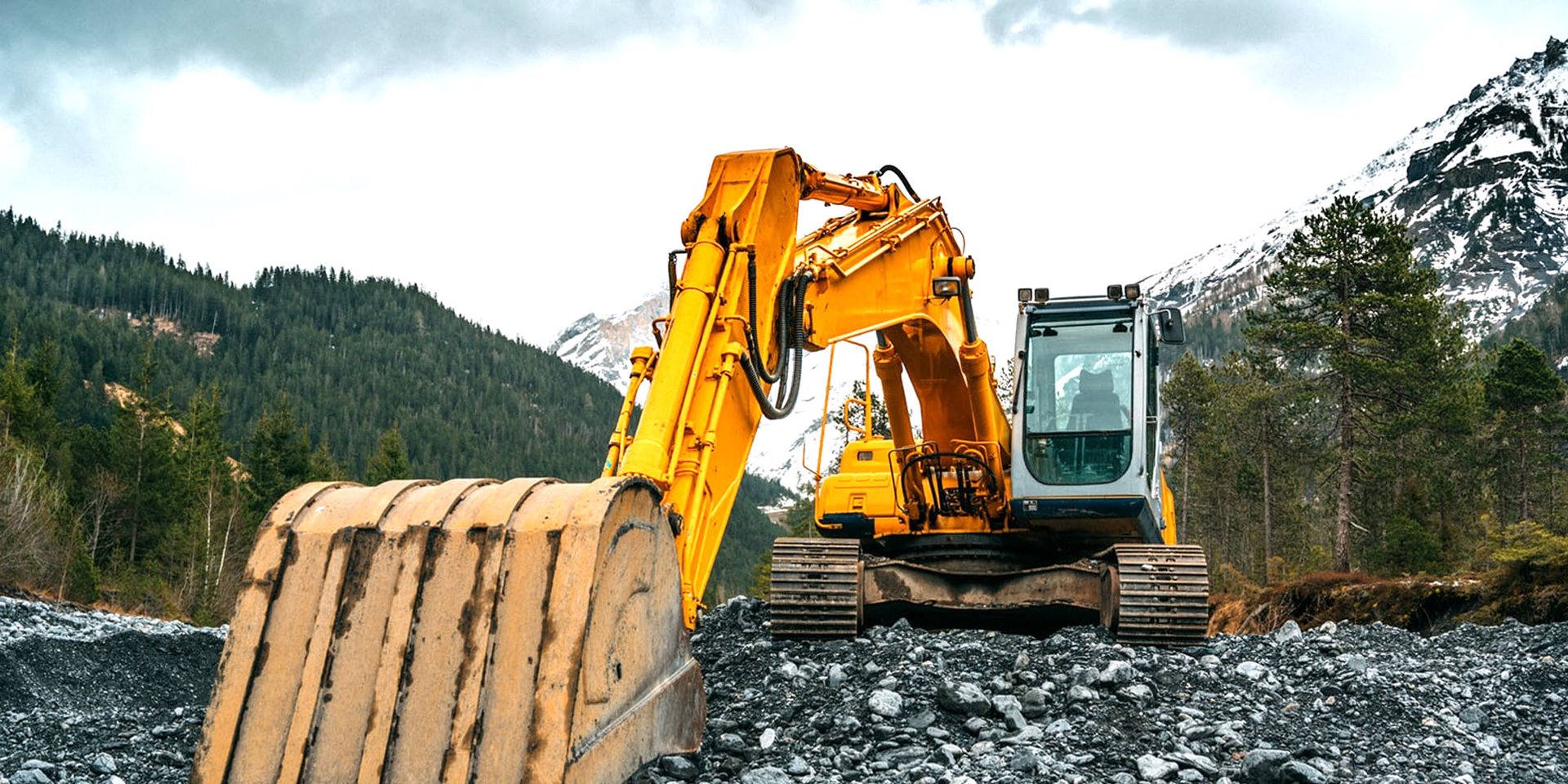 Excavator in the mountains